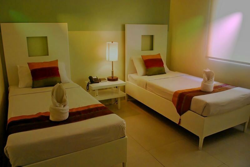 โรงแรมเอ็มไพร์ สวีท Puerto Princesa ภายนอก รูปภาพ